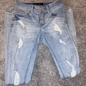 Distressed skinny jeans